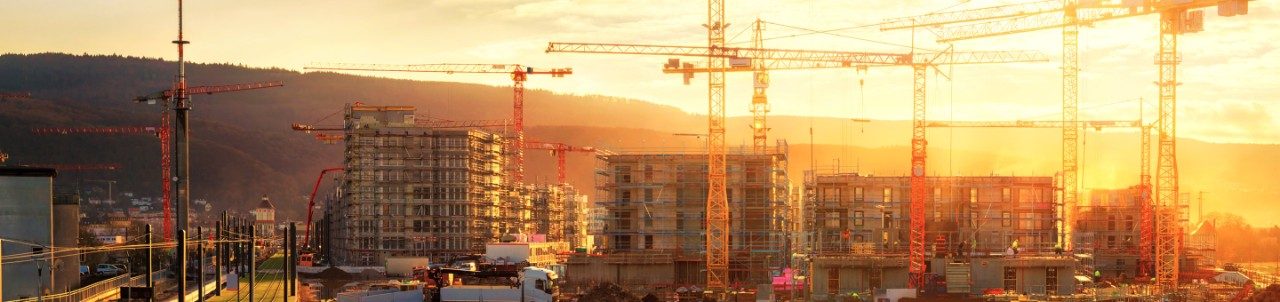 Construction site at work at sunset